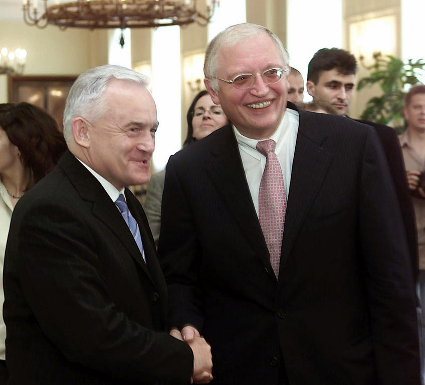 Rencontre entre Leszek Miller et Günter Verheugen (Varsovie, 11 juillet 2002)