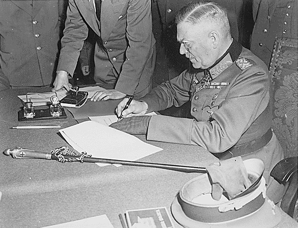 Field Marshal Wilhelm Keitel signs the Act of Military Surrender in Berlin (8 May 1945)